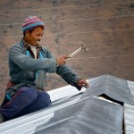 nepal-worker-on-roof