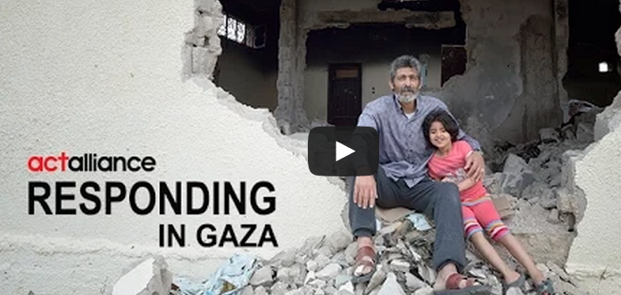 Fawzi Abu Jame'a, with his 7-year old daughter Raghad, sit in the ruins of what was once his parents' home Khan Yunis, Gaza. Houses in the area were destroyed by Israeli air strikes during the 2014 war between the state of Israel and the Hamas government of Gaza ACT/Paul Jeffrey