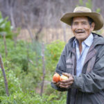Photo of man working in garden in Bolivia