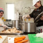Cooking in the communal kitchen - young people take responsibility and care for themselves and others in a programme for unaccompanied minors seeking asylum in Austria. Photo: Nadja Meister / Diakonie Flüchtlingsdienst