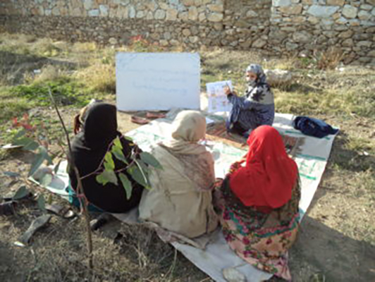 The midwife of Nawdamorra Sub Health Center in Laghman province conducted an awareness session on COVID-19 to sensitize the women in the community. Photo: CWSA