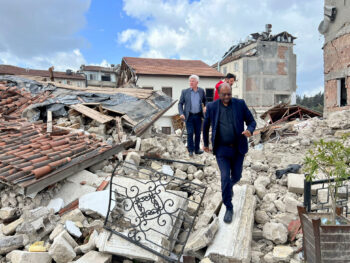 The general secretaries of ACT Alliance and WCC visiting the site of a collapsed building in southern Türkiye.